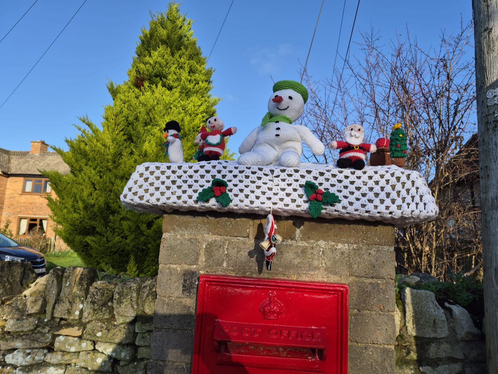 Snowman on the post box